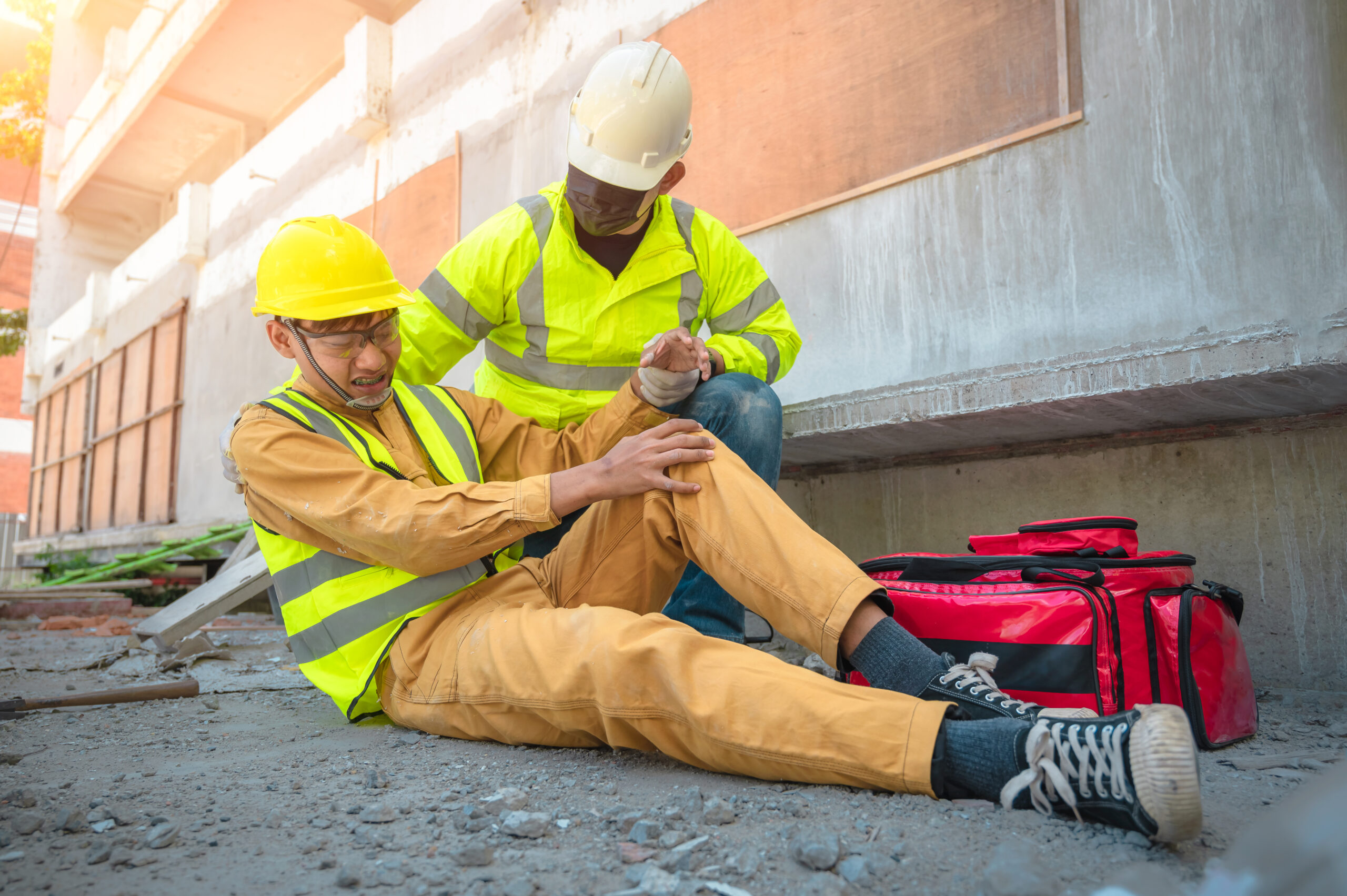 Construction worker has an accident at a construction site. Emer